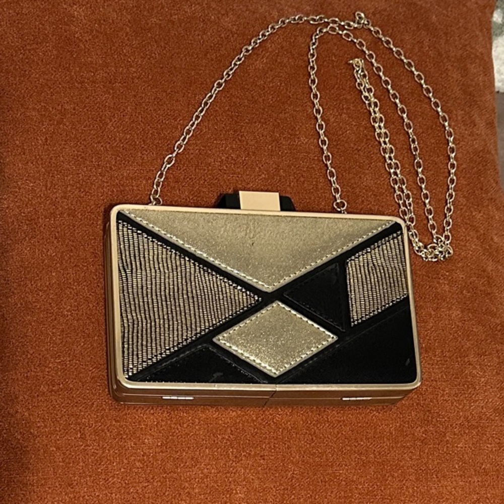 Elegant Black and Gold Clutch Bag